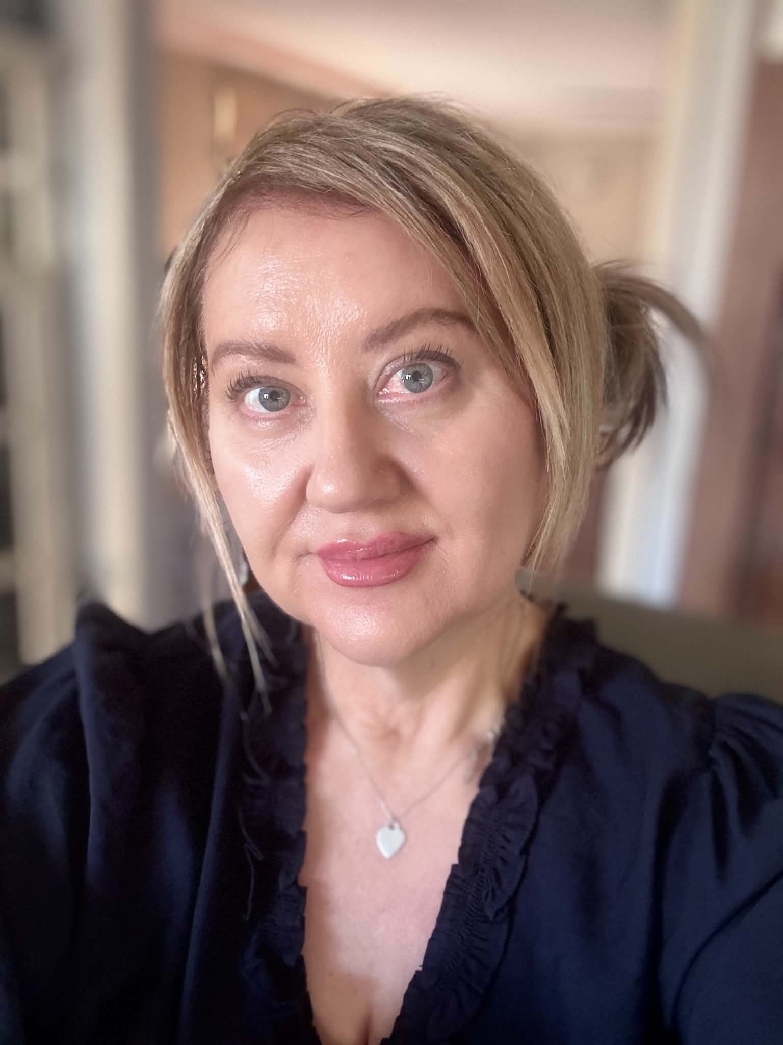 Headshot of Sharon Norton podcast host